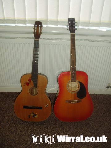 Attached picture TWO GUITARS.JPG